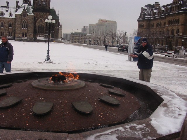 The 'eternal flame' out the front is useful for the freezing Ottawa weather.  I suppose its why they put it there.