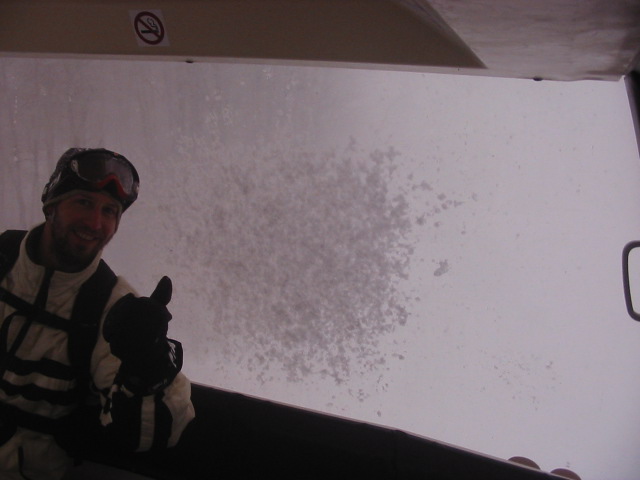 Random tripper in the Gondola on the last run of the day.  It was such a severe snowstorm at the summit in the late afternoon that you couldn't see more than 3 metres around you, except for shadows.  Dangerous, but worth it for the powder conditions all the way down....