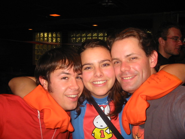 At Saturday night's Dutch party.  Apparently some Prince fella in Holland is marrying a queen or something, and so the Dutch students were particuarly excited and decked out a bar here on Campus and celebrated in true dutch style (i.e., got really drunk).  [Standing with Sebastian (from Chile) and Nadine (Holland)]