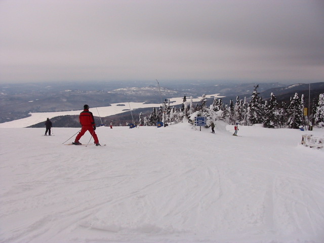 Riding from the top, brilliant views down to a frozen lake at near the base.  Probably one of the best things about snowboarding, the great fun in a beaut environment...